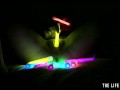 Watch this hot blonde plunge glowsticks in her pussy and ass