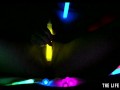 Watch this hot blonde plunge glowsticks in her pussy and ass