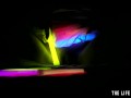 Watch this hot blonde plunge glowsticks in her pussy and ass