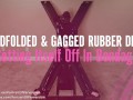 Blindfolded & Gagged Rubber Doll Gets Itself Off In Bondage