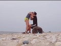 I sucked his hard cock on the beach and then swallowed his cum