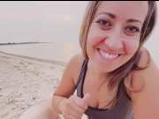 I sucked his hard cock on the beach and then swallowed his cum