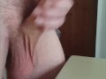 A big cumshot with cum overflowing from the cock