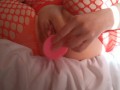 Girl playing with her pink dildo