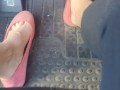 Pedal pumping in dirty worn out pink flat ballet shoes no socks
