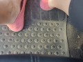 Pedal pumping in dirty worn out pink flat ballet shoes no socks