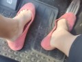 Pedal pumping in dirty worn out pink flat ballet shoes no socks
