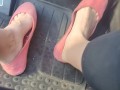 Pedal pumping in dirty worn out pink flat ballet shoes no socks