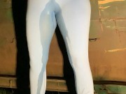 Slut drenches her yoga pants in piss outdoors