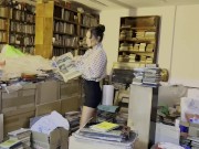 Librarian Monika Foxxx has fun with a telephone handset and big toys