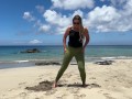 girl doing yoga on the beach and pissed her pants Public