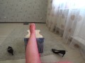POV. Trying on nylon tights and high heels.