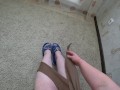 POV. Trying on nylon tights and high heels.