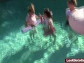 Four skinny ladies in the pool along with their male friend