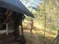 Nude girl walking in the village