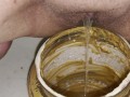 Girl pisses in 5lb jar of peanut butter