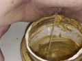 Girl pisses in 5lb jar of peanut butter