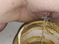 Girl pisses in 5lb jar of peanut butter