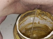 Girl pisses in 5lb jar of peanut butter