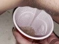 Girl pisses in red solo cup