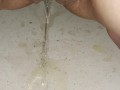 Girl pisses in tub