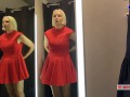 Naked girl with a big tits in the public locker room, try on transparent clothes