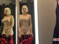 Naked girl with a big tits in the public locker room, try on transparent clothes