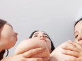Andrea and Esther suck on big tits
