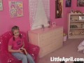Little April sit in Bubble Chair and strip off showing her natural tits and Pussy. She fingering har