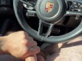 Jerking off in public parking lot. Cum on Porsche steering wheel.