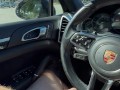 Jerking off in public parking lot. Cum on Porsche steering wheel.