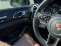 Jerking off in public parking lot. Cum on Porsche steering wheel.