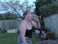 Trashy Kiwi bitch treats you to her pissing in the back yard with close-up view