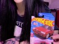 Goth girl shows off Hotwheels collection and stretches her tight pussy
