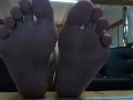 beautiful latina with dirty soles of her feet