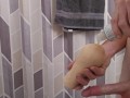 Fit American guy master masturbates in the shower with a toy