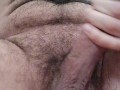 Hairy man jerking his big dick and balls until he cums with hot moanings.