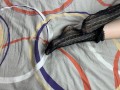 Caressing long legs of girl in black lace socks