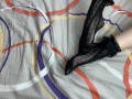 Caressing long legs of girl in black lace socks