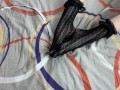 Caressing long legs of girl in black lace socks