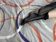 Caressing long legs of girl in black lace socks