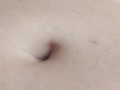 Just playing with my bellybutton and showing my pussy