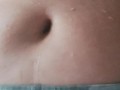 Just playing with my bellybutton and showing my pussy