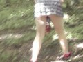 Sexy cute Milf without panties under skirt picks mushrooms in forest. Outdoor Outside In public Solo