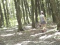 Sexy cute Milf without panties under skirt picks mushrooms in forest. Outdoor Outside In public Solo