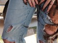 Rubbing mud all over my ripped denim jeans teasing you  clothing destruction