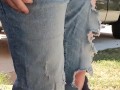 Rubbing mud all over my ripped denim jeans teasing you  clothing destruction