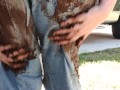 Rubbing mud all over my ripped denim jeans teasing you  clothing destruction