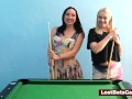 A big tits lesbian couple playing billiard and using the stick in a new way