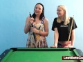 A big tits lesbian couple playing billiard and using the stick in a new way